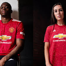 It is predominantly red with the white adidas three stripes branding on the shoulders and still has the. Manchester United Unveil New 2020 21 Home Kit The Busby Babe
