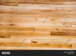 The golden oak color adds warmth, while the natural knot holes, nail holes, and oxidization marks bring a sense of history and texture to the room. Wood Floor Surface Top Image Photo Free Trial Bigstock