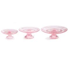 Porcelain ones are heat resistant; Pink Depression Glass Cake Plate Set