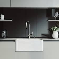 The task was to fit this +200lb sink into ikea cabinets to match the rest of our kitchen design. Vigo 24 Inch Crown Apron Front Matte Stone Farmhouse Kitchen Sink