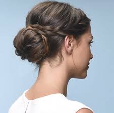 Braided bun hairstyle is ideal for a bad hair day. This Pretty Braided Bun Is Way Easier Than You Think Allure