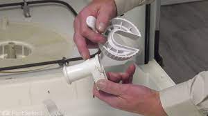 If your disposal still has leftover food inside, turn it on to clear the passage. Frigidaire Dishwasher Repair How To Replace The Drain Trap Frigidaire 154252701 Youtube