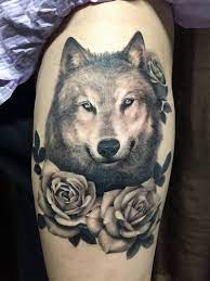Chronic Ink Tattoo Toronto Tattoo Wolf And Roses Tattoo Done By Janice Wolf Tattoos Rose Tattoos For Women Rose Tattoos