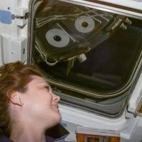 Cpt. Jeannie Terrell signs the flight manifest roster