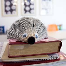 Now a bit about book folding or folded book art: How To Make An Adorable Paperback Book Hedgehog Pink Stripey Socks