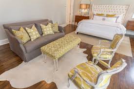 A yellow couch or sofa can be the centerpiece of the room. Gray Sofa With Yellow Chairs Transitional Bedroom