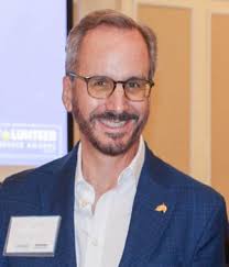 Planting Stronger Roots: Paul Gilbert's Commitment to Community and Nature 