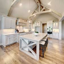This rustic wooden kitchen is paired with a white vaulted ceiling that makes a perfect combination. Pin On Model Homes