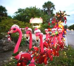 Santa S 12 Lit Up Reindeer Are Ready To Pull His Boat This Holiday Season Wallartroad Flamingo Florida Christmas Flamingo Christmas Christmas Decorations