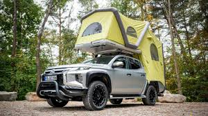 If you find a lower price on a camping tent somewhere else, we'll match it with our best price guarantee. Mitsubishi S Inflatable Rooftop Tent Turns A Truck Into A Camper