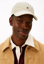 Tommy Hilfiger Cap Beige TOMMY HILFIGER Cap In Beige ABOUT YOU