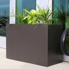Dress up your yard with a modern cement or black & white planter. Large Outdoor Planters