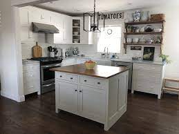 Countryside amish furniture offers beautiful hardwood kitchen islands in a variety of styles ranging from classic and traditional, to farmhouse and contemporary. Our Farmhouse Kitchen Amish Loft Shaker Cabinets Painted In Bm Simply White Laminate Kitchen Flooring Kitchen Cabinets And Flooring Best Flooring For Kitchen