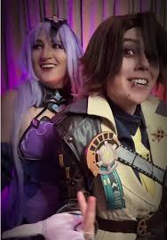Cosplay of Dottore and Lisa Minci from Genshin Impact