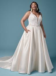Find a gown that will compliment your curves. 15 Flattering Wedding Dresses For Plus Size Brides