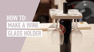 A modern diy wine rack made out of a sheet of plywood and decorated with holes to store your wine and a creative wine glass holder. Diy Wine Glass Holder Youtube