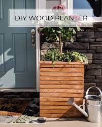 On the upper portion of our planter boxes we used a thick piece of cardboard to shield the dirt and plants from over spray. Diy Wood Planter Box Plans Crafted By The Hunts