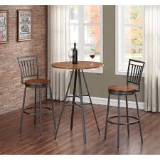 Bar height tables are named as such because they are most frequently found in bars and restaurants. American Woodcrafters Filmore 3 Piece Pub Height Table Set P1 101 B101 3pc Bellacor