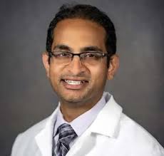 Dr. John B. Holroyd, MD