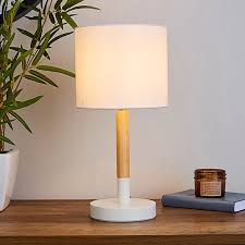 Add warmth & light to any space with a table lamp. Dion White Wood Table Lamp Dunelm