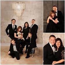 Black Bling Barking Formal Family Portrait In Tux Lbd S And Puppy Family Portrait Poses Family Photo Studio Formal Family Portrait