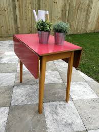 Check out our formica dining table selection for the very best in unique or custom, handmade pieces from our kitchen & dining tables shops. Original 1960s Red Formica Drop Leaf Dining Table With Wooden Legs Vintage Retro Mid Century Kitchen Table La195315 Loveantiques Com
