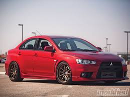 The mitsubishi lancer evolution x is the tenth generation of the lancer evolution, a sports sedan produced by japanese manufacturer mitsubishi motors. Mitsubishi Lancer Evolution X Lower Wider Better