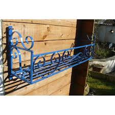 The arch tapered iron window boxes are a favorite of homeowners, renters and landscape designers alike. Wrought Iron Window Box 42 Inch Long Decorative Scrolled Front And Sides