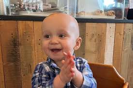 Happy' one-year-old baby 'lucky to be alive' following fall