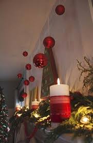 Hang Ornaments From The Ceiling With White Thumbtacks Over The Fireplace Hanging Christmas Lights Christmas Inexpensive Christmas