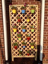 Even If You Have A Small Deck Or Patio You Can Still Enjoy Lots Of Lush Greenery Take Advantage Large Backyard Landscaping Trellis Plants Hanging Flower Pots
