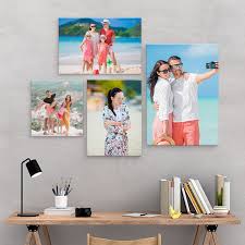 Turn your yearly photographs of the kids into beautiful personalized canvas prints, or get creative and make a custom photo tile for each member of the family to hang on your wall. 10 Easy Ways To Hang Canvas Art In 2021 Canvaschamp