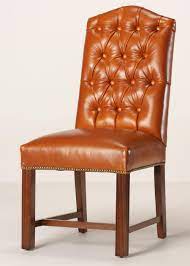 Measurements = h, 77cm w, 75cm l, 190cm a. Leather Tufted Camel Back Dining Chair
