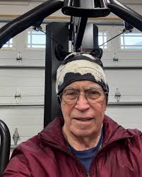 Time for some levity. “It takes serious skills to look this stupid “. A  year ago I posted a similar photo of me weight training in my super cold  garage. That was