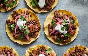 Tostada literally means toasted and usually we use the word to refer to dishes made on crispy fried flat tortillas. What Is A Tostada How Is It Different Than A Taco Allrecipes