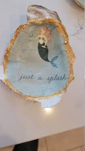 Mermaid Oyster Shell Holding Martini