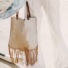 cowhide fringe bolsa