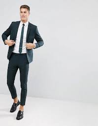 A pale blue floral wrap a statement pale blue maxi fitting dress with a sculptural bodice and one shoulder plus a side slit, statement earrings and a clutch for a formal wedding. River Island Skinny Suit In Dark Green Summer Wedding Suits Wedding Outfit Men Mens Fashion Suits