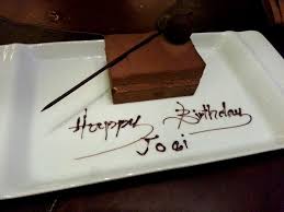 It's a chocolate sponge cake soaked with chocolate syrup, frosted to make this chocolate cake extraordinary, i wrapped the cake with a chocolate wrap! Write Happy Birthday With Chocolate Syrup On A Plate Birthday Plate Chocolate Syrup Birthday