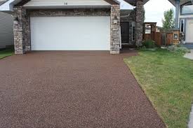 Concrete driveways have a wide range of costs, from $4 for paving over gravel to $20 a square foot for complex patterns, with most falling between $8 and $12 a square foot for a new driveway. Riverrock Concrete Driveway Resurfacing Calgary Alberta Concrete Driveway Resurfacing Edmonton Alberta Concrete Coatings