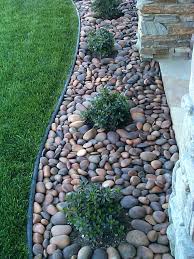 Rocks come in a variety of shapes, styles, textures and colors. Black Star Gravel Landscape Black Granite Landscape Gravel Star Small Front Yard Landscaping Landscaping With Rocks Rock Garden Landscaping