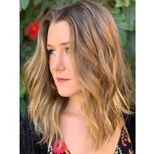 The stylist uses a sharp razor, either razor edged or razor comb to chop the hair at angles. How To Video Razor Cut Lob Wavy Texture Behindthechair Com