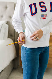 Hoodies are one of the most common clothing items in most thrift stores… which makes them perfect for refashioning. How To Crop A Sweatshirt No Sew Beginner Project Merrick S Art
