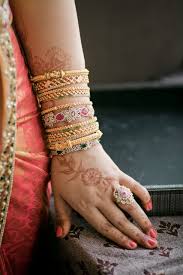 Studded red & gold silk thread bangles. Teluguwedding Wedding Weddingideas Bride Indianwedding Wedmantra Indianjewellery Jewellery Sareeide Bangles Jewelry Designs Bridal Bangles Gold Jewelry Fashion