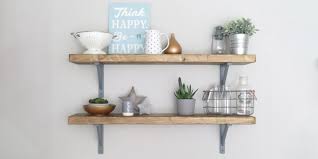 The neutral white color goes with everything. Build It Fitting Fixed Shelving Using Shelf Brackets