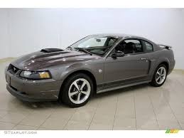 All yellow red blue green black white orange gold silver brown gray pink purple glow grabber. Dark Shadow Gray 2004 Ford Mustang