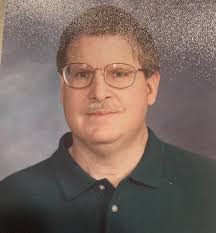 Can someone enhance the photo quality and remove the glare?