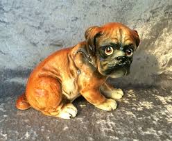 Four boxer ceramic figurinesfrom $40.00 vintage ceramic boxer dog statue figurinefrom $4.99 boxer dog veterinarian figurine bandaged paw ears vintage ceramic rescue puppyfrom $19.99 1940s 1960s Vintage Shafford Large Boxer Dog Puppy Ceramic Figurine Statue With Impressed Logo Mark In