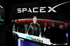 SpaceX President Floats Tesla Merger as Stock Debuts on Nasdaq