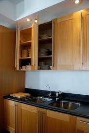 A white tile backsplash provides contrast to the blue cabinet color. 7 Kitchen Cabinet Trends To Watch In 2016